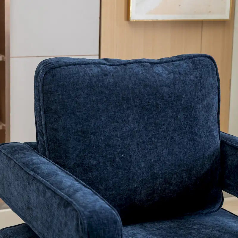Sillón moderno tapizado giratorio, con respaldo abierto tipo barril y cojín